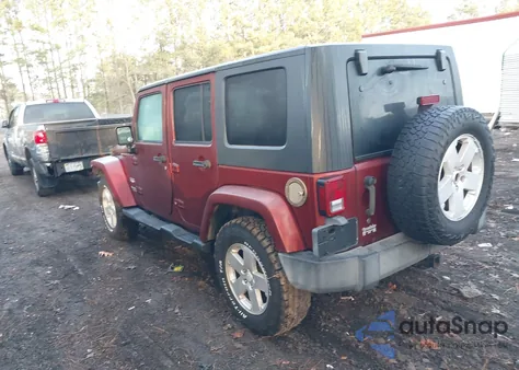 2007 Jeep Wrangler Unlimited Sahara from USA, damaged, VIN 1J8GA59157L157934